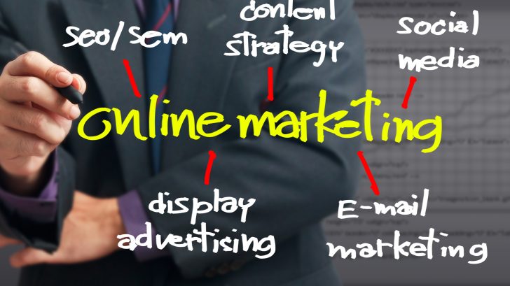Man writing the online marketing information
