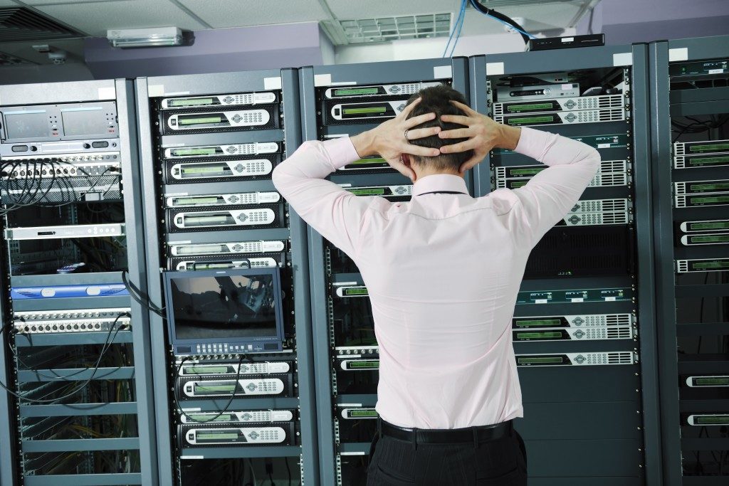 Frustrated employee in the server room
